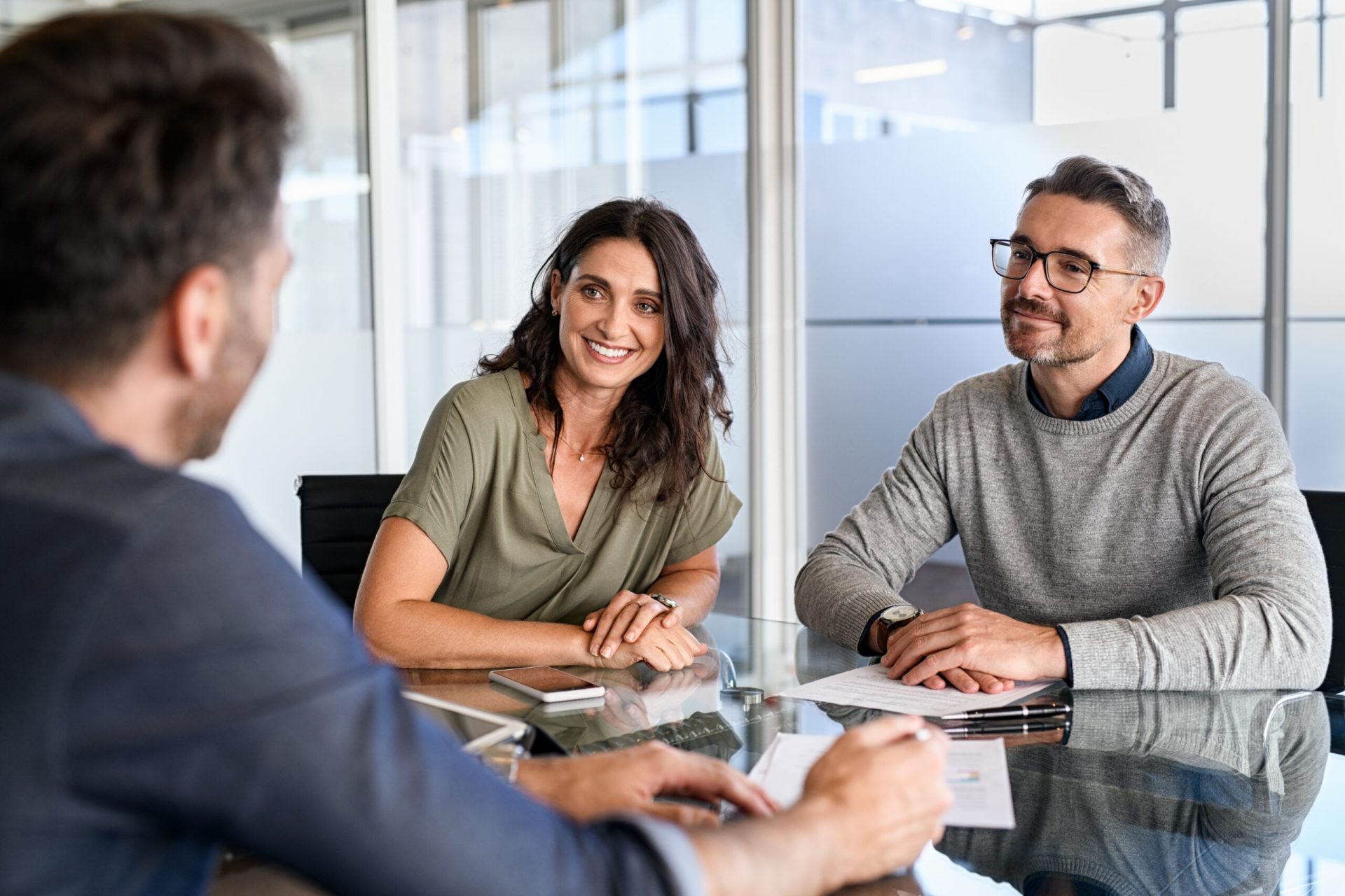 clients-listening-to-their-broker-describe-fundings-loan-solutions-scaled